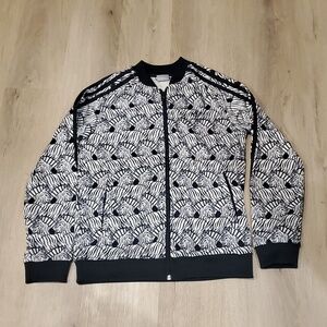Girls' Adidas Zebra Print Jogger Zip-up Jacket. Size youth medium.